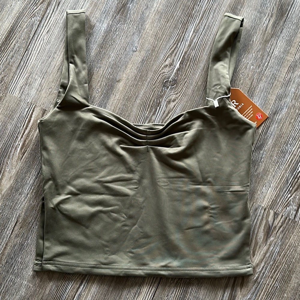 New with tags! Green Size M tank top with side slits and scrunch top!